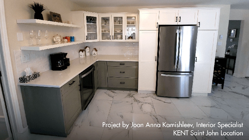 A well-equipped kitchen with a refrigerator, sink, and microwave, highlighting essential appliances for meal preparation.